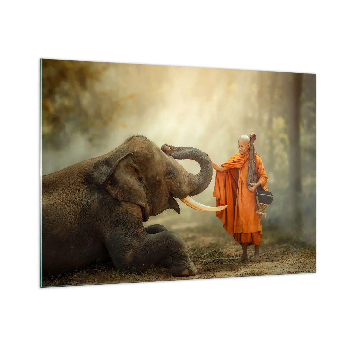 Obraz na szkle - Mnich w pomarańczowych szatach z słoniem w naturalnym otoczeniu - 100x70cm - Spotkanie w podróży - Nowoczesna dekoracja ścienna do salonu, kuchni i sypialni ARTTOR