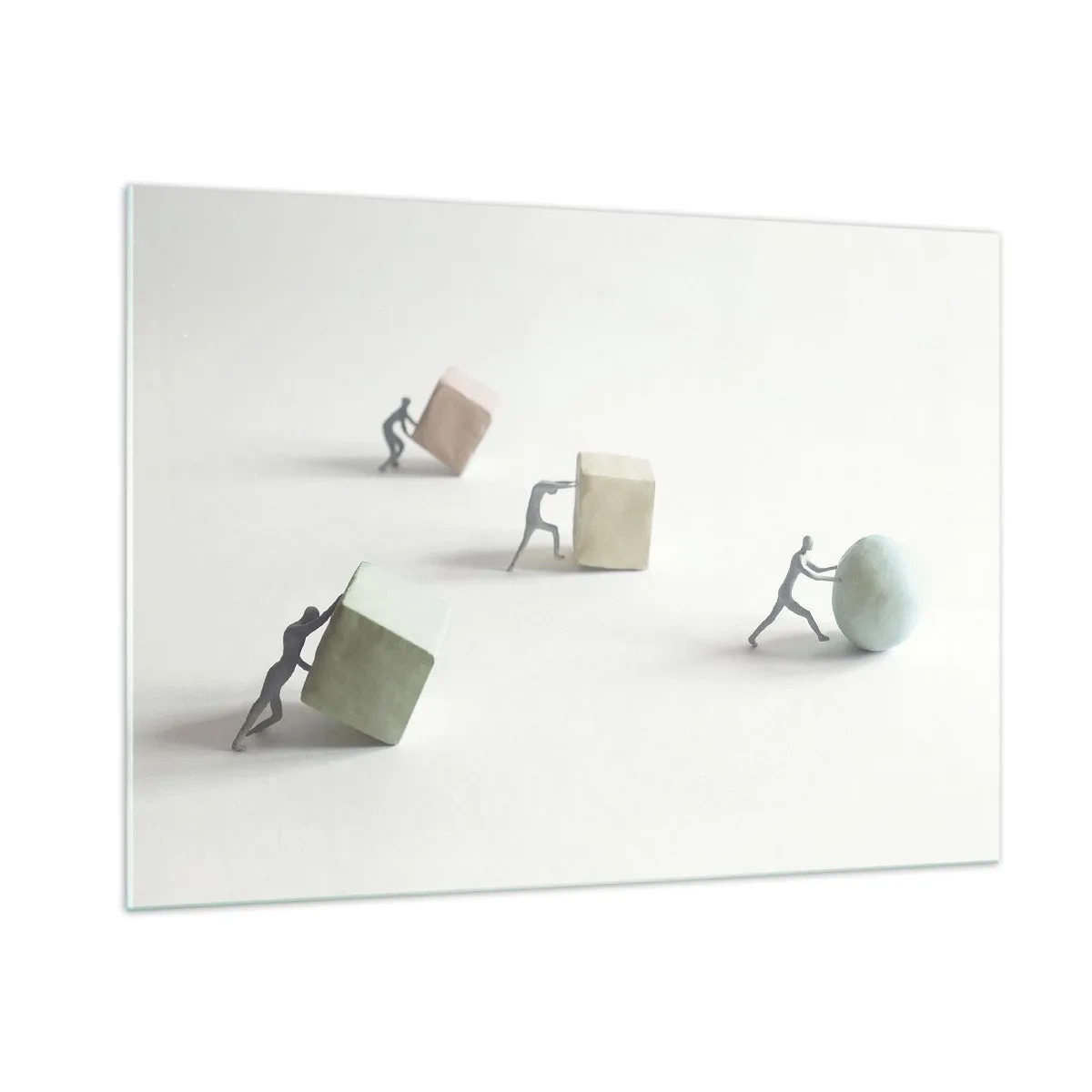 Obraz na szkle - Miniaturowe postacie toczą i pchają geometryczne bryły - 100x70cm - Samo życie - Nowoczesna dekoracja ścienna do salonu, kuchni i sypialni ARTTOR