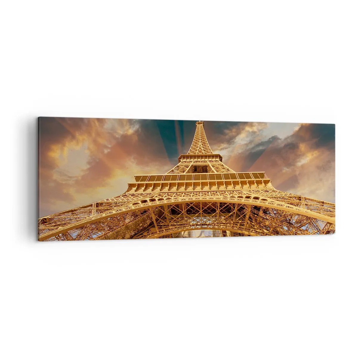 Obraz na płótnie - Wieża Eiffla z perspektywy dolnej na tle zachodzącego słońca - 140x50cm - Jak ludzkość sięgnęła nieba - Nowoczesna dekoracja ścienna do salonu i sypialni ARTTOR