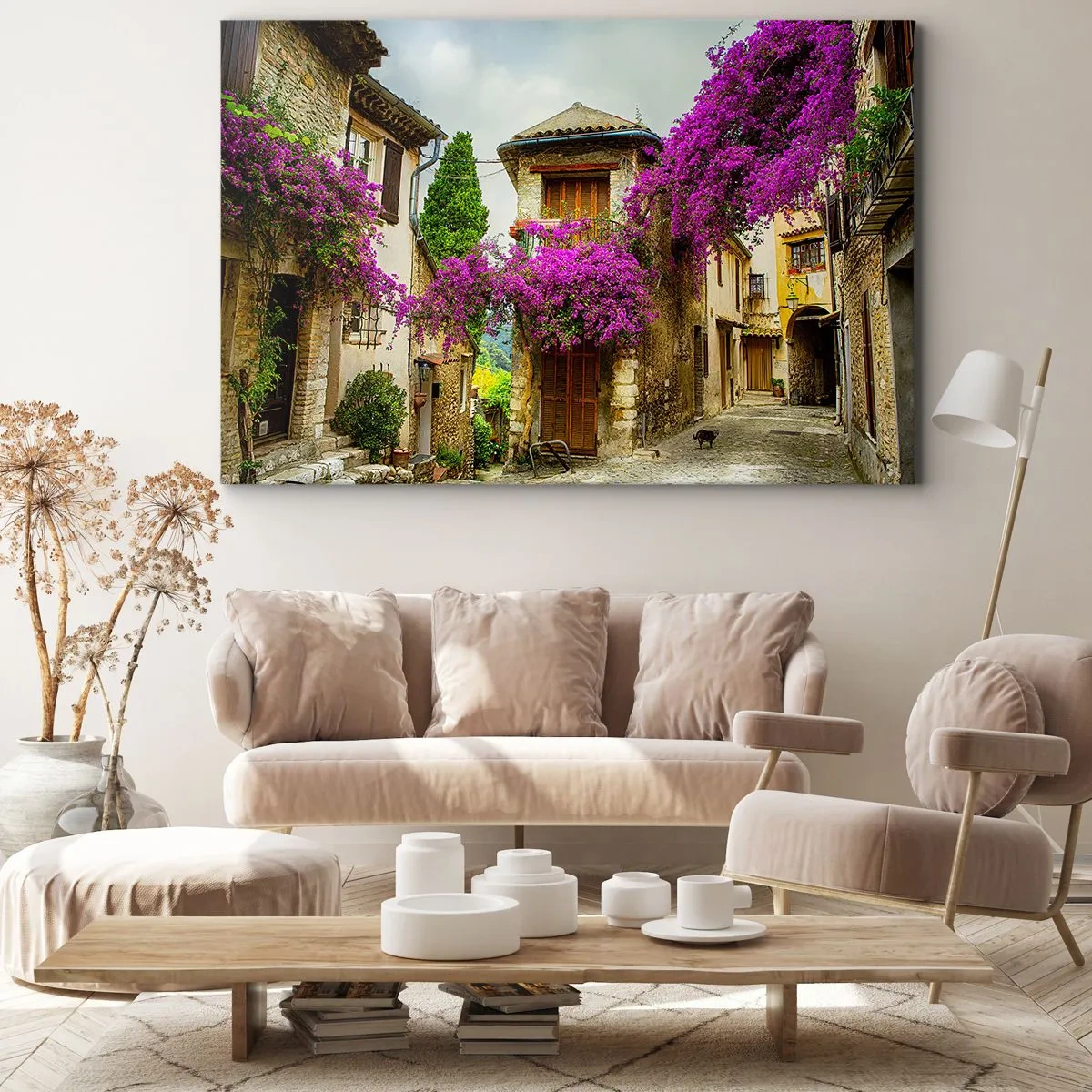 Obraz na płótnie - Kamienna uliczka z różowymi kwiatami i domami - 70x50cm - Pod kwietnym baldachimem - Nowoczesna dekoracja ścienna do salonu i sypialni ARTTOR