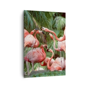 Obraz na płótnie - Grupa flamingów w tropikalnym otoczeniu palm - 70x100cm - Popołudniowe ploteczki - Nowoczesna dekoracja ścienna do salonu i sypialni ARTTOR
