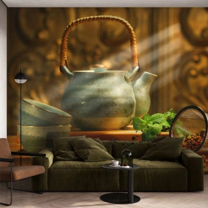 Fototapeta Premium Canvas - Ceramiczny dzbanek z filiżankami i suszem herbacianym - 100x70cm - Traktat o piciu herbaty - Nowoczesna dekoracja ścienna do salonu i sypialni ARTTOR