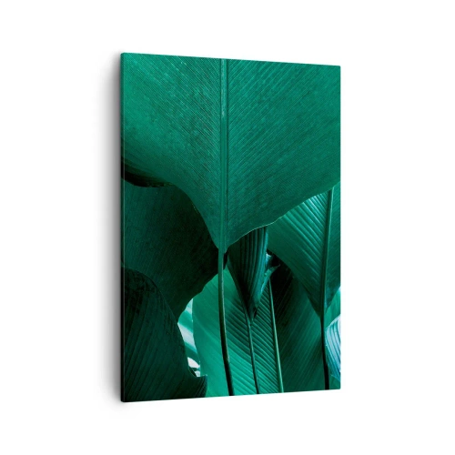 Obraz na płótnie - Zielone liście roślin tropikalnych w zbliżeniu - 50x70cm - Zwrócone do światła - Nowoczesna dekoracja ścienna do salonu, kuchni i sypialni ARTTOR