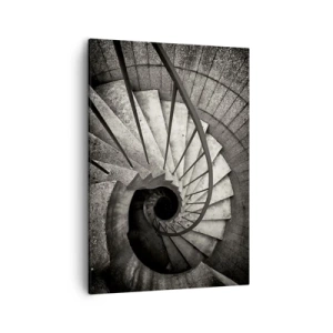 Obraz na płótnie - Czarno-biała fotografia spiralnych schodów w perspektywie z góry - 50x70cm - Schodami w górę, schodami w dół - Nowoczesna dekoracja ścienna do salonu, kuchni i sypialni ARTTOR