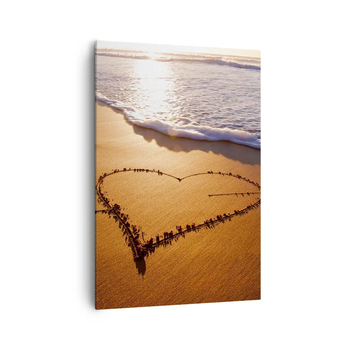 Obraz na płótnie - Serce z piasku na plaży podczas zachodu słońca - 70x100cm - Wakacyjne wyznanie - Nowoczesna dekoracja ścienna do salonu i sypialni ARTTOR