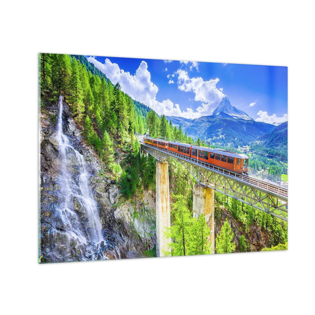 Obraz na szkle - Alpejski pociąg na moście z widokiem na wodospad - 70x50cm - Kolej na Alpy - Nowoczesna dekoracja ścienna do salonu i sypialni ARTTOR
