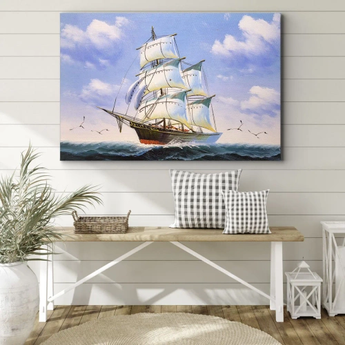 Obraz na płótnie - Dumnie z wiatrem - Żaglowiec na otwartym morzu pod błękitnym niebem - 70x50cm