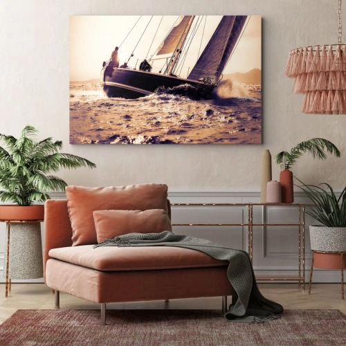 Obraz na płótnie - Żeglujże, żeglarzu - Jacht na wzburzonym morzu w świetle zachodzącego słońca - 70x50cm